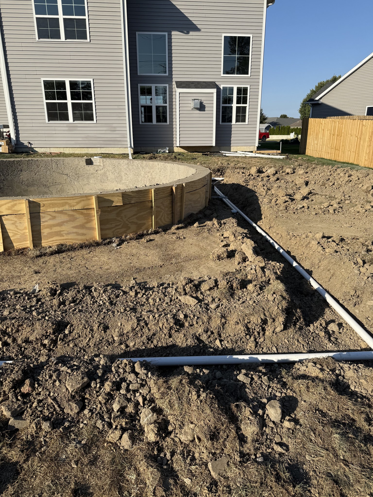 Rock-Solid Artistry: The 100-Ton Foundation of a Perfect Pool Deck - Image 1