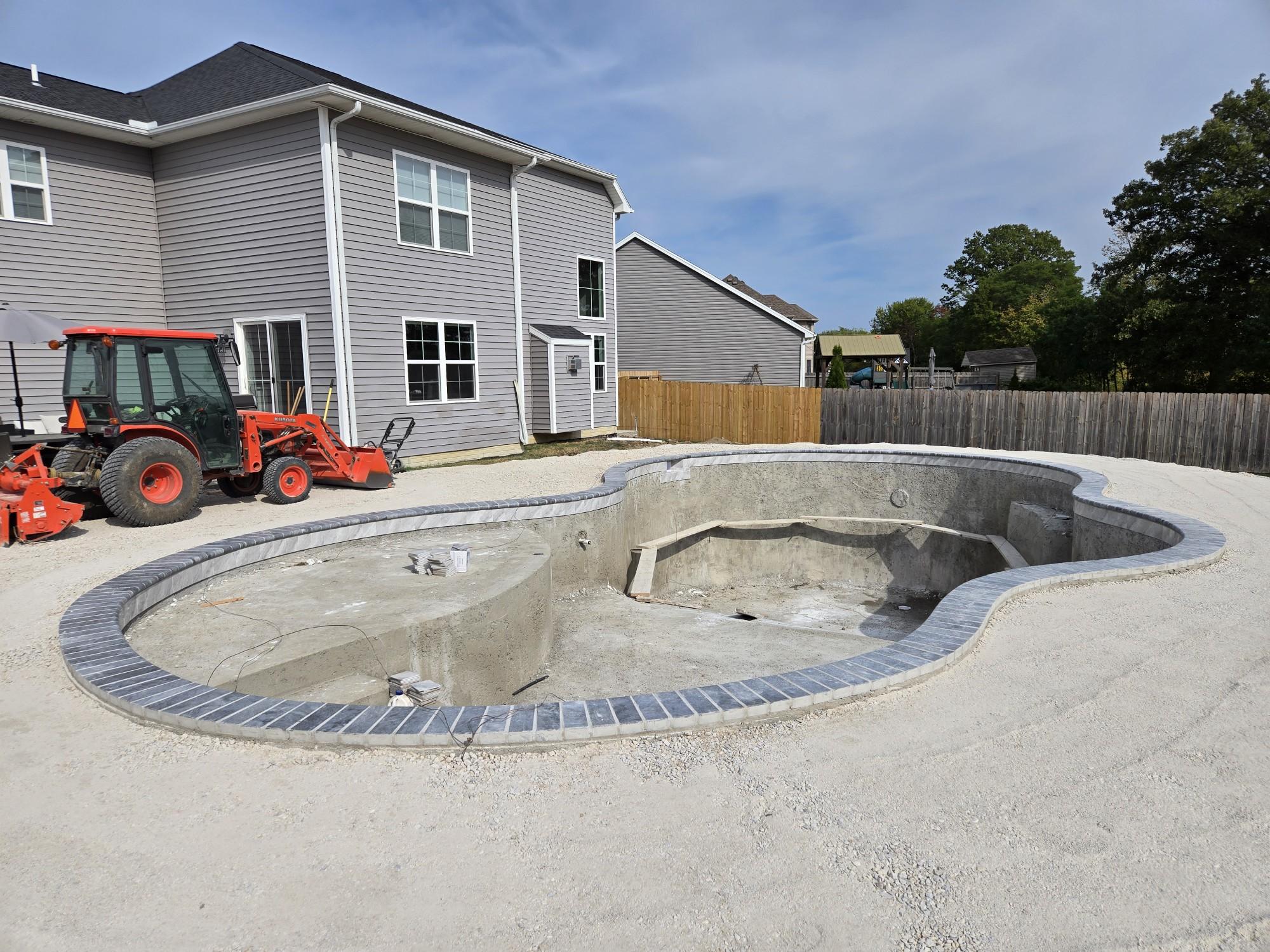 Rock-Solid Artistry: The 100-Ton Foundation of a Perfect Pool Deck - Image 4