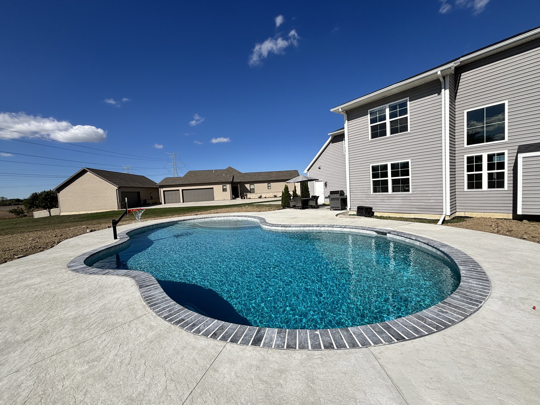 Rock-Solid Artistry: The 100-Ton Foundation of a Perfect Pool Deck - Image 8