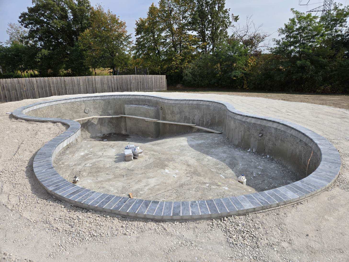 Rock-Solid Artistry: The 100-Ton Foundation of a Perfect Pool Deck - Image 3