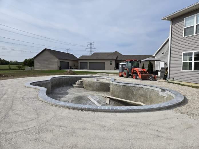 Rock-Solid Artistry: The 100-Ton Foundation of a Perfect Pool Deck - Image 5