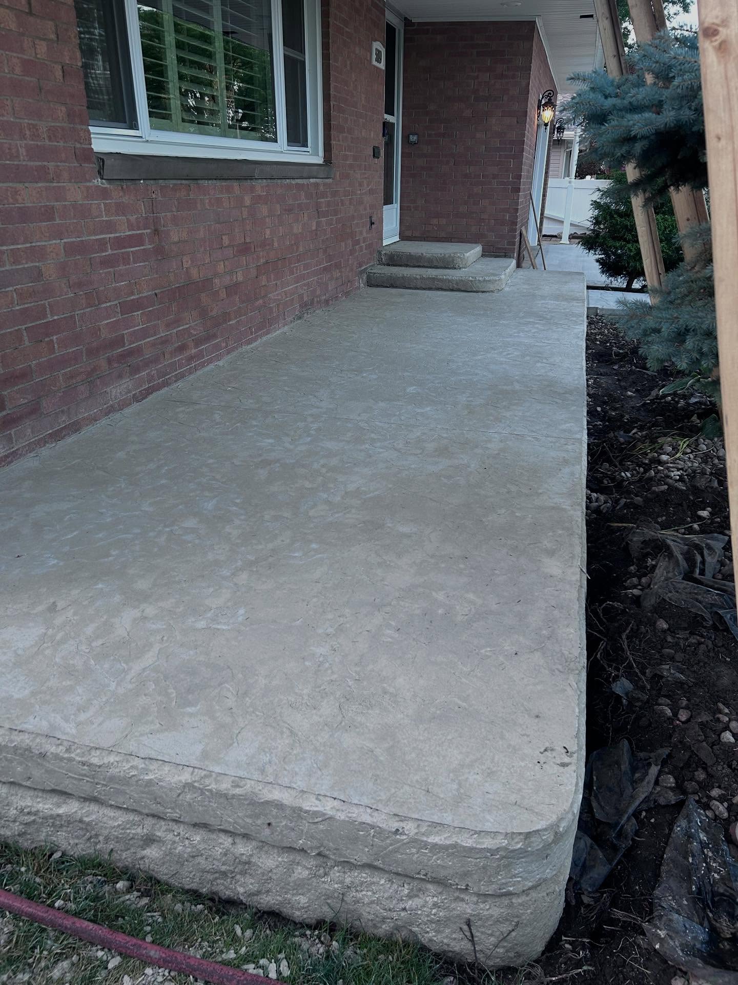 Elevating Curb Appeal with Custom Mixed-Finish Concrete - Image 3